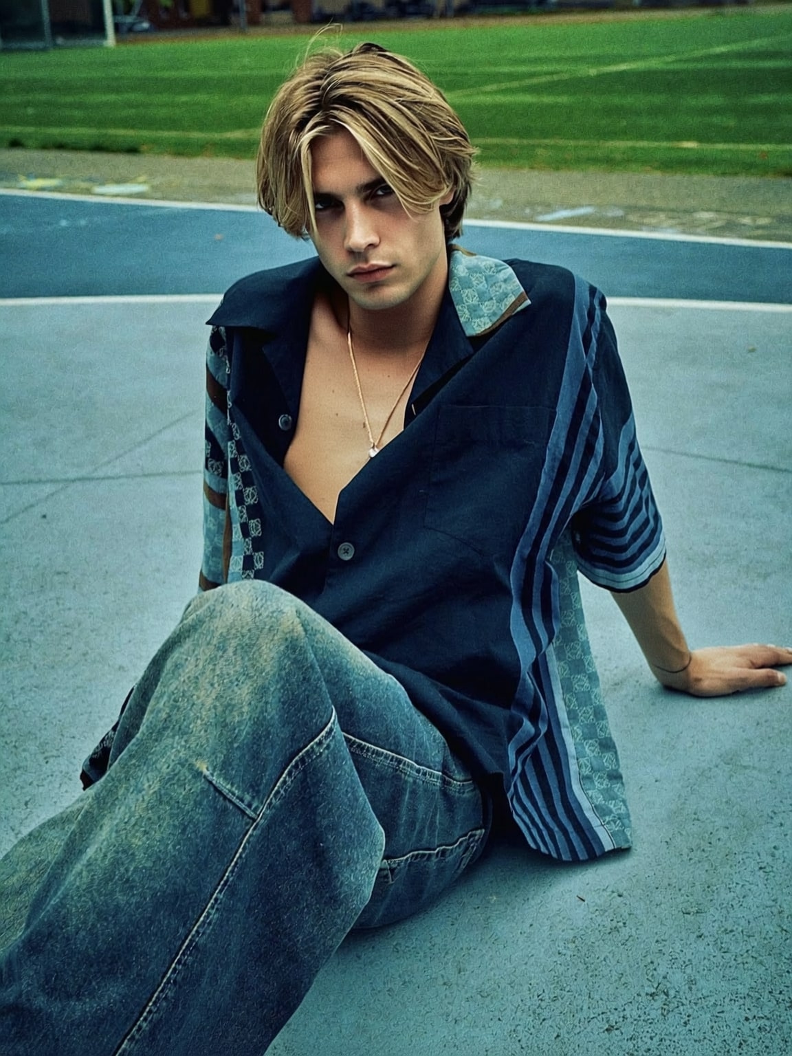 tight-frame paparazzi shot of Damon Cael’s upper-body outfit details, rising pop artist Damon Cael.