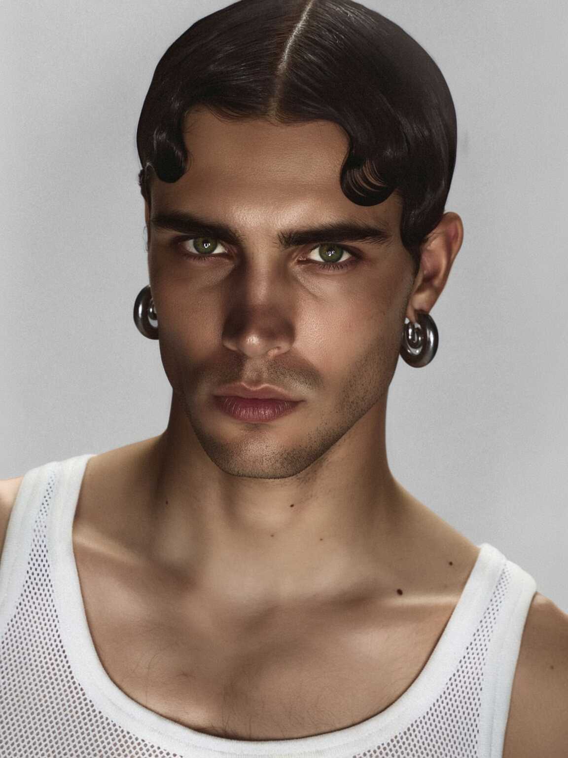 event-exit paparazzi shot of Damon Cael in sharp lapel coat, rising pop artist Damon Cael.