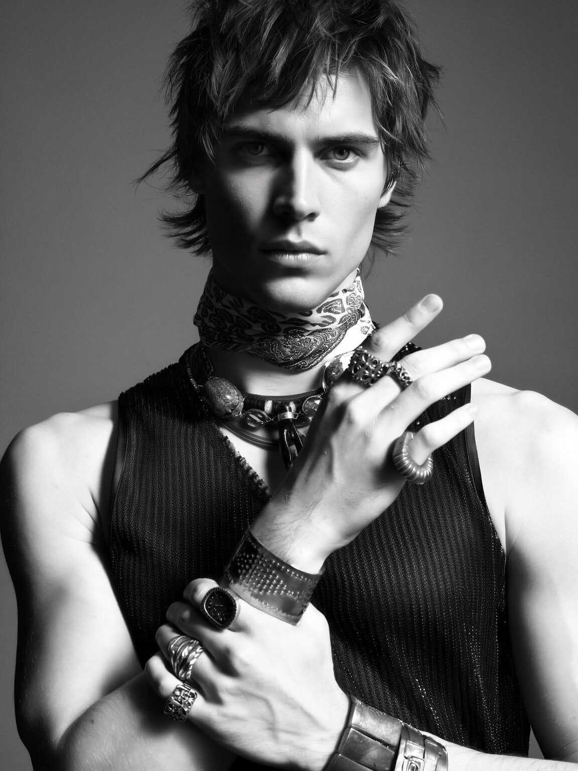 paparazzi-style candid of Damon Cael in bold couture, rising pop artist Damon Cael.